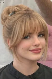 Messy Bun and Curtain Bangs